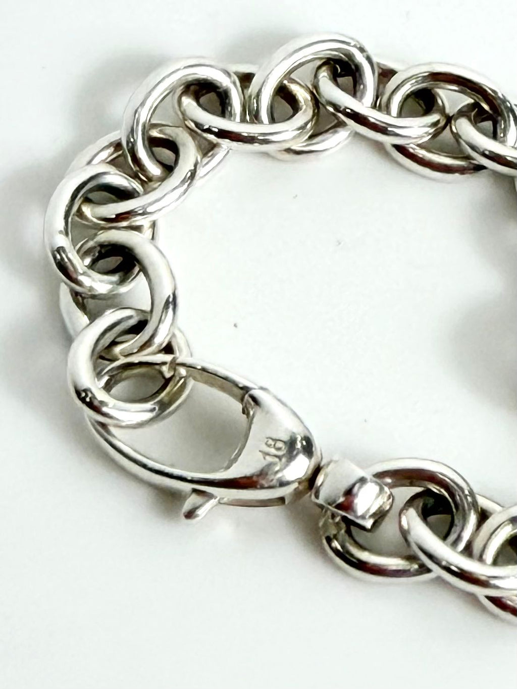 GUCCI GG CUTOUT HEART CHARM STERLING SILVER BRACELET