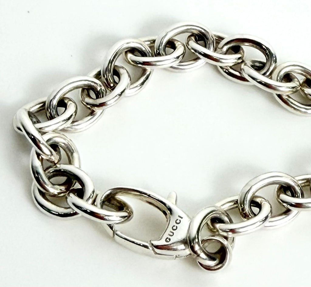 GUCCI GG CUTOUT HEART CHARM STERLING SILVER BRACELET