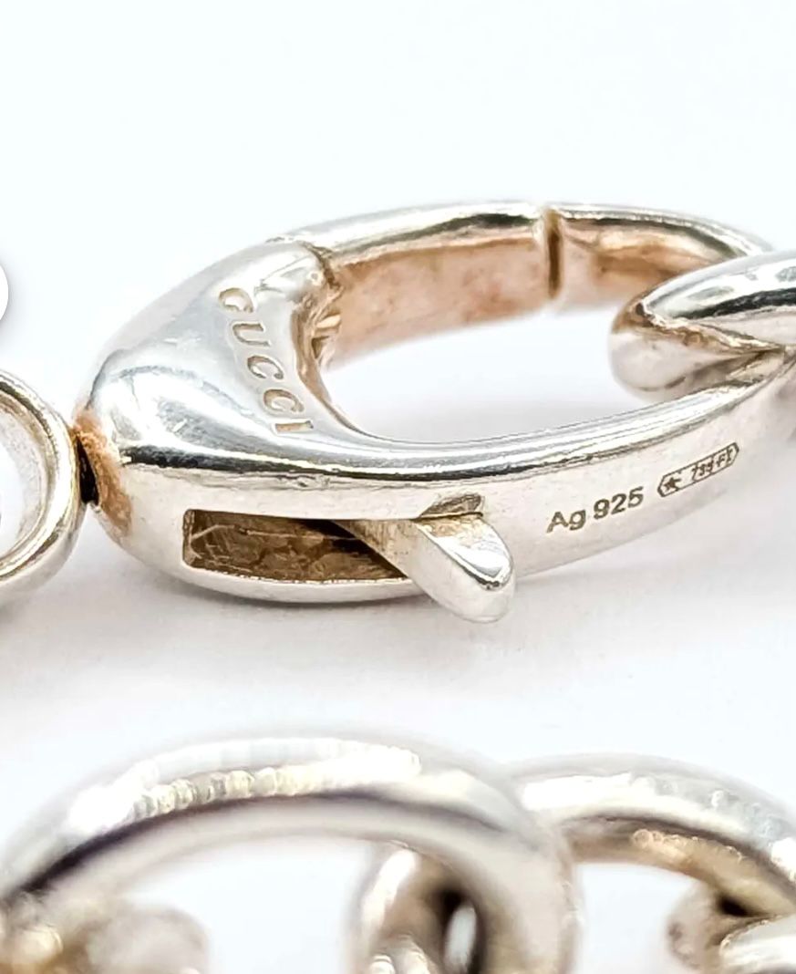 GUCCI GG CUTOUT HEART CHARM STERLING SILVER BRACELET