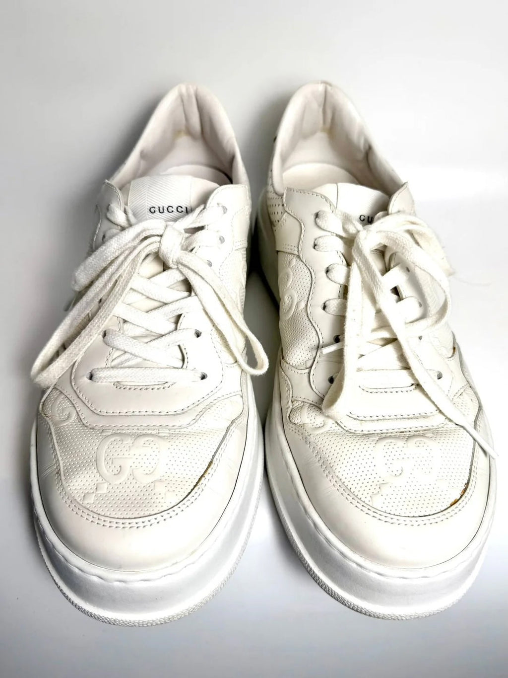 GUCCI GG EMBOSSED LEATHER MEN'S SNEAKERS