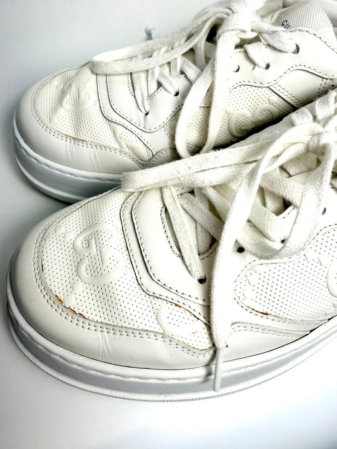 GUCCI GG EMBOSSED LEATHER MEN'S SNEAKERS