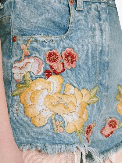 GUCCI EMBROIDERED RAW EDGE DENIM SHORTS