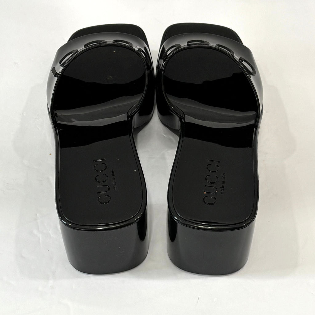 GUCCI EMBOSSED LOGO RUBBER PLATFORM SANDALS