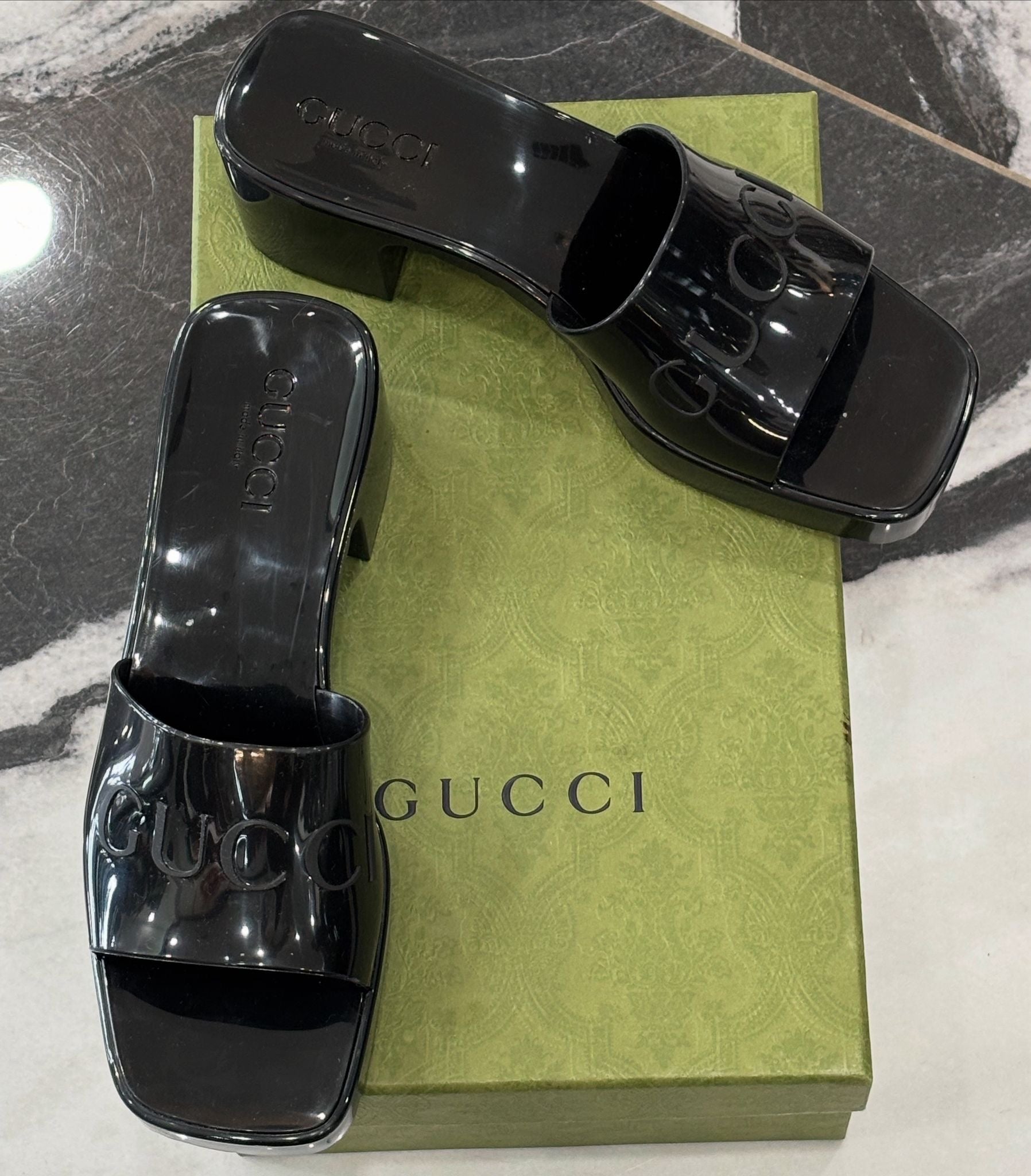 GUCCI EMBOSSED LOGO RUBBER PLATFORM SANDALS