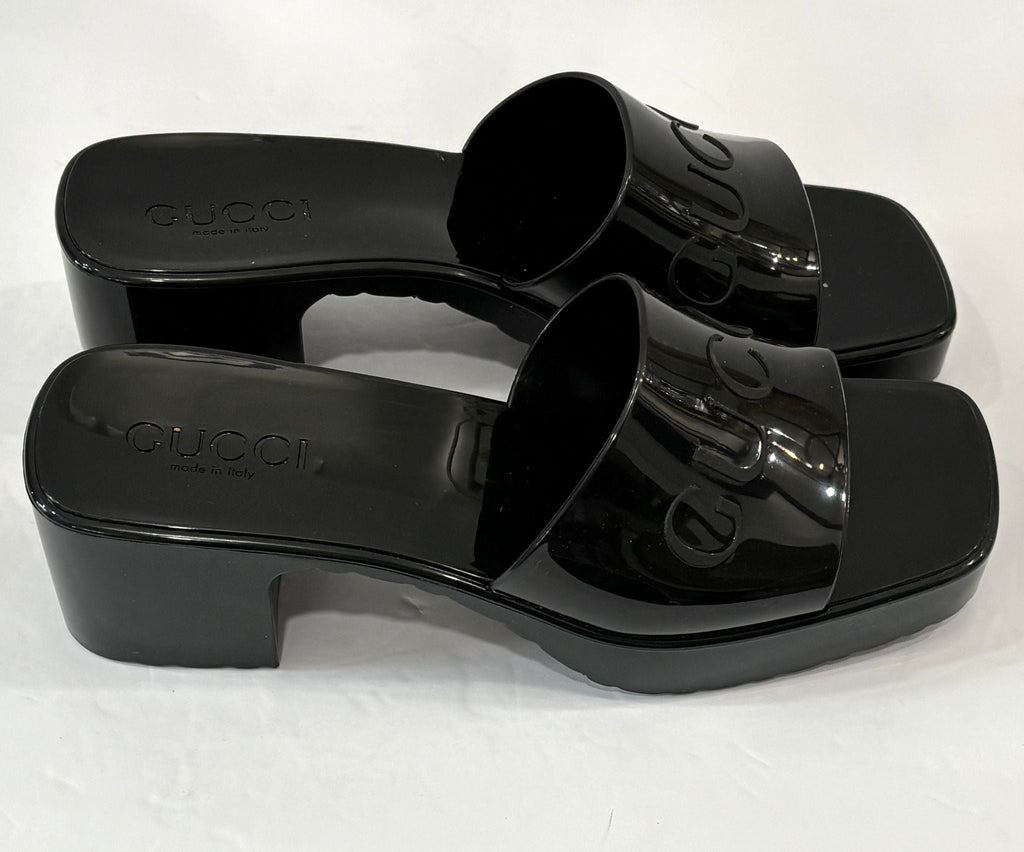 GUCCI EMBOSSED LOGO RUBBER PLATFORM SANDALS