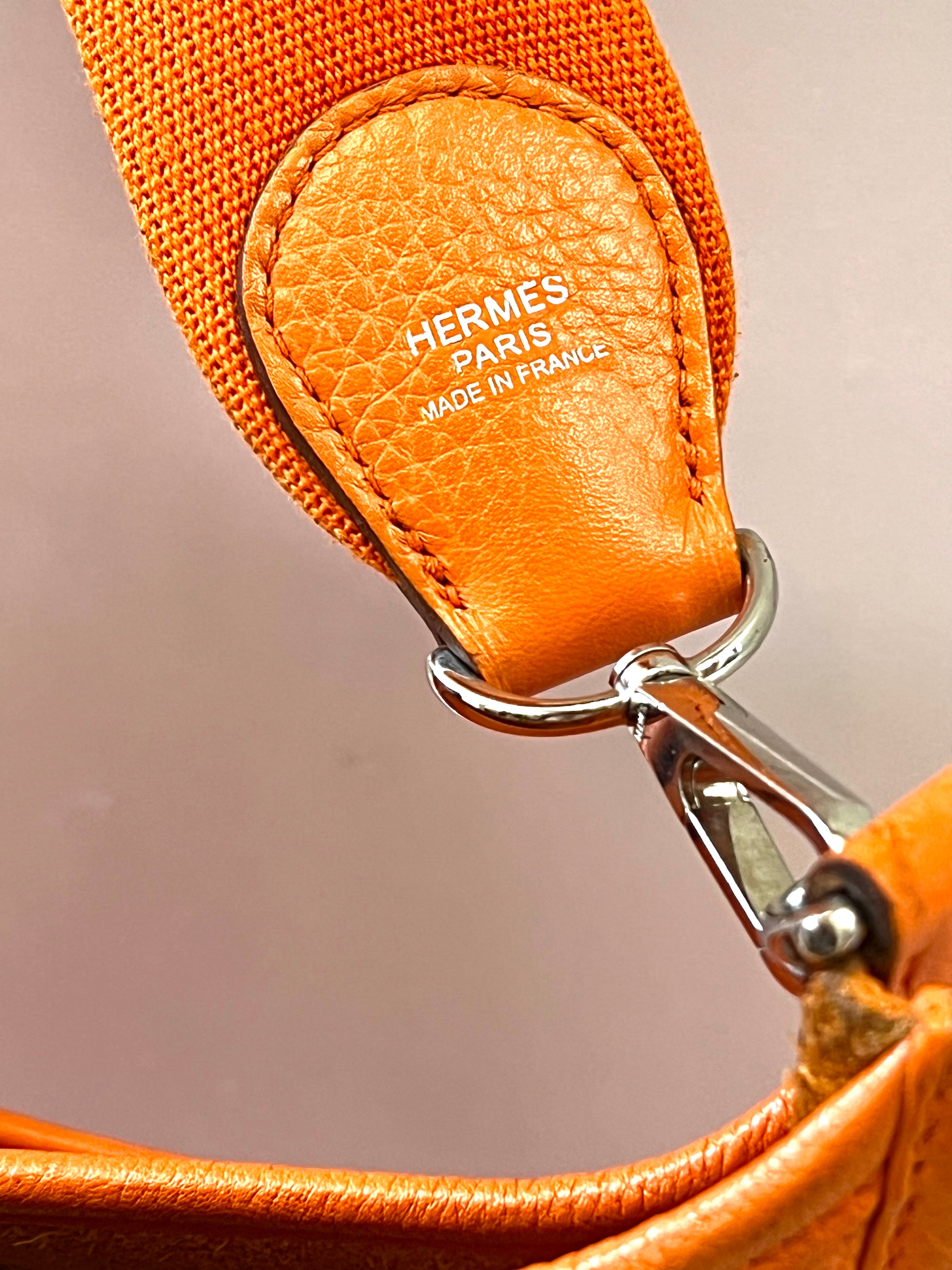 HERMÈS EVELYNE III PM CLEMENCE SHOULDER BAG IN ORANGE