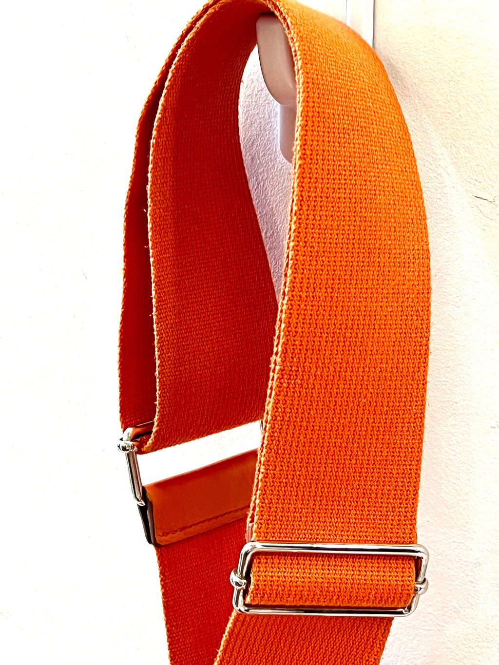 HERMÈS EVELYNE III PM CLEMENCE SHOULDER BAG IN ORANGE