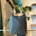 LOUIS VUITTON Monogram Excursion Shoe Bag