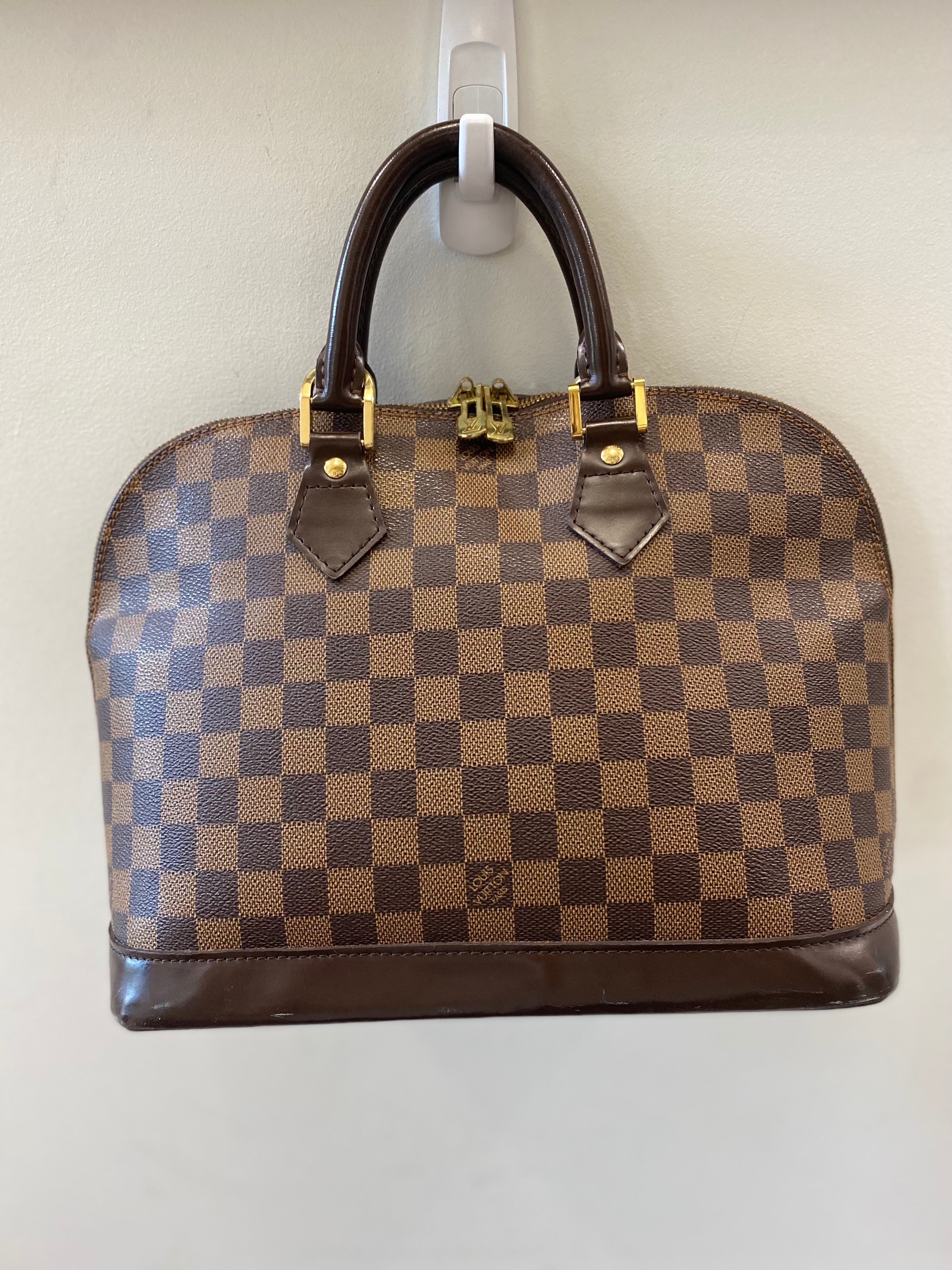 LOUIS VUITTON DAMIER EBENE ALMA PM HANDBAG