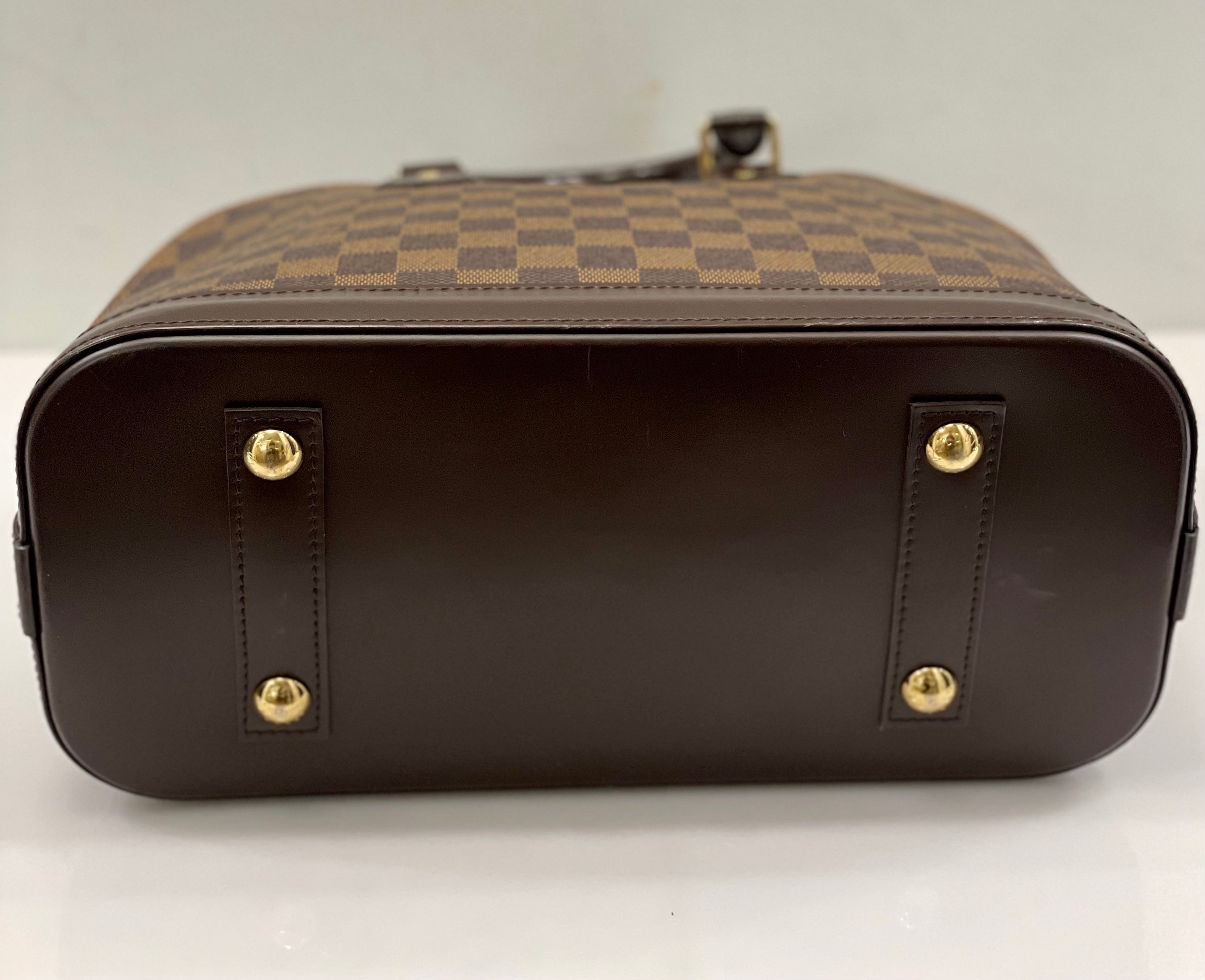 LOUIS VUITTON DAMIER EBENE ALMA PM HANDBAG