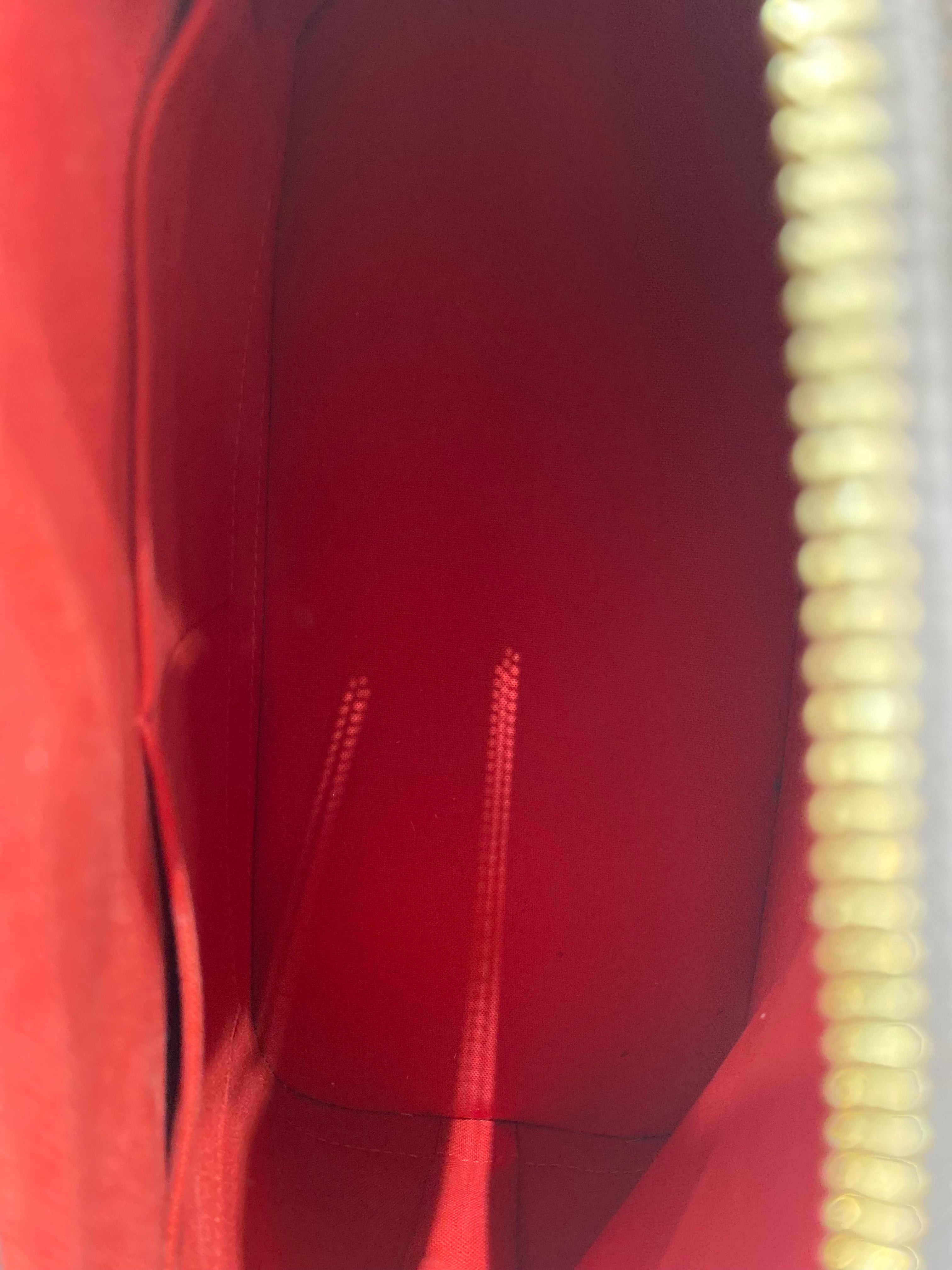 LOUIS VUITTON DAMIER EBENE ALMA PM HANDBAG