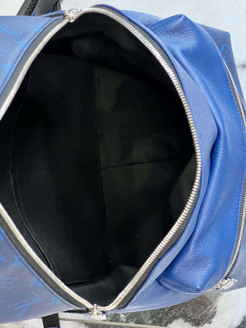 LOUIS VUITTON TAIGA LEATHER DISCOVERY BACKPACK
