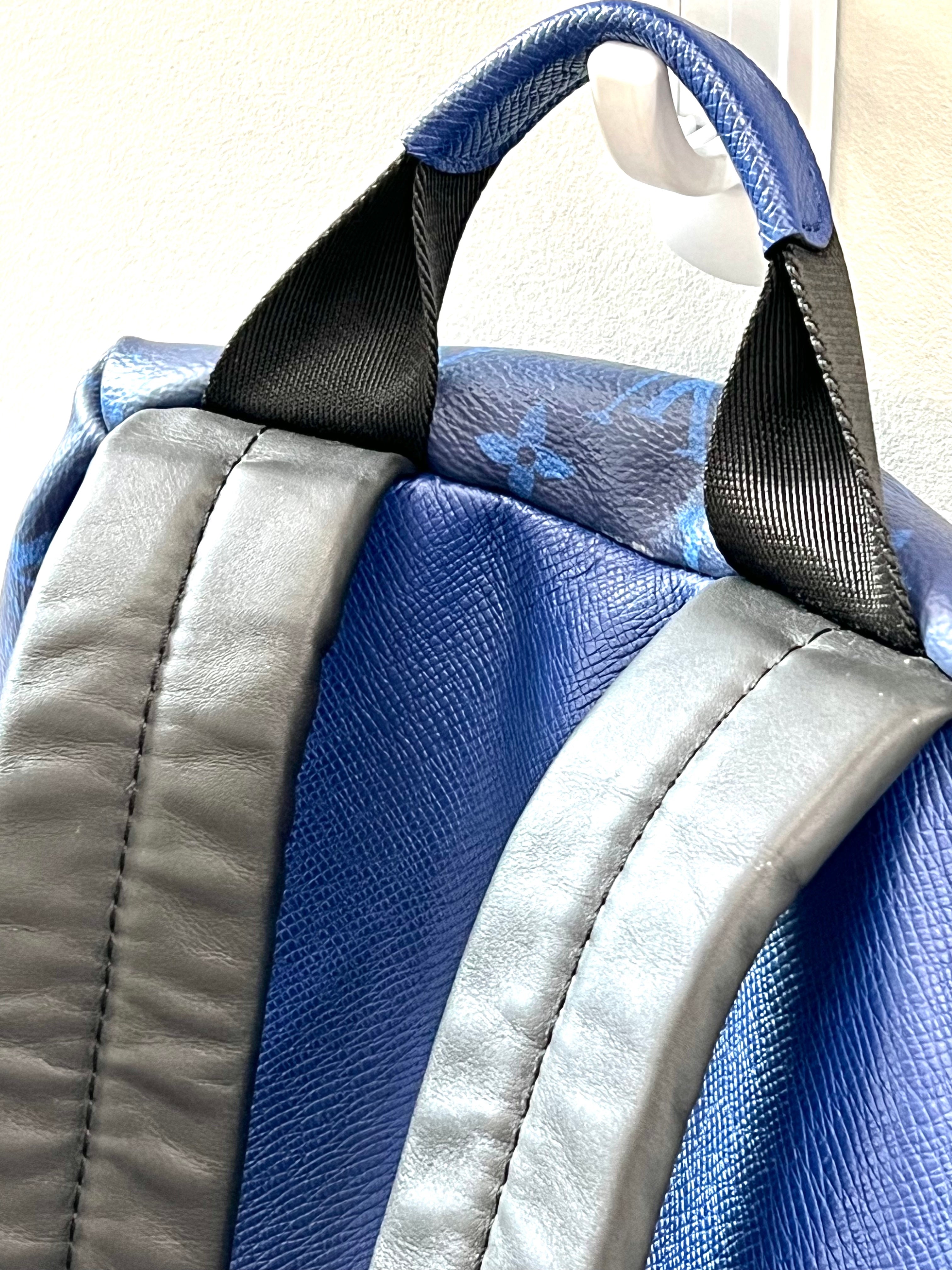 LOUIS VUITTON TAIGA LEATHER DISCOVERY BACKPACK