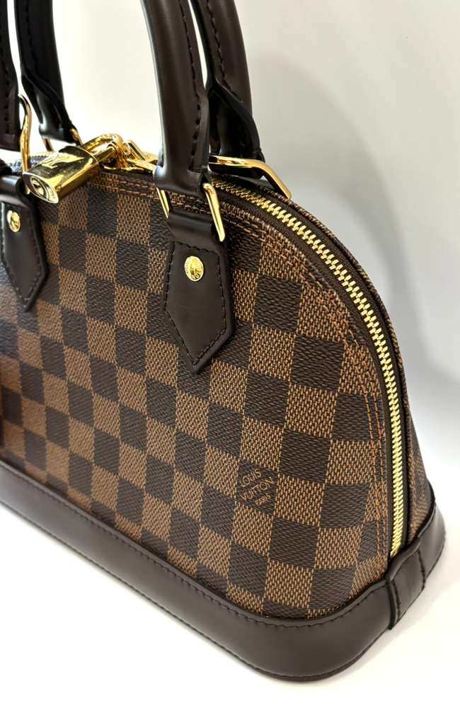 LOUIS VUITTON DAMIER EBENE ALMA BB CROSSBODY BAG