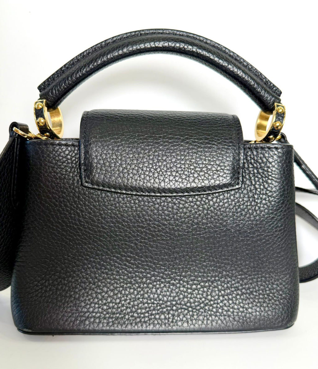 LOUIS VUITTON TAURILLON LEATHER MINI CAPUCINES BAG