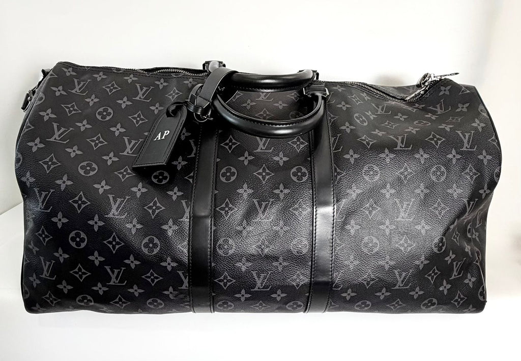 LOUIS VUITTON MONOGRAM ECLIPSE KEEPALL BANDOULIÈRE 55 DUFFLE BAG