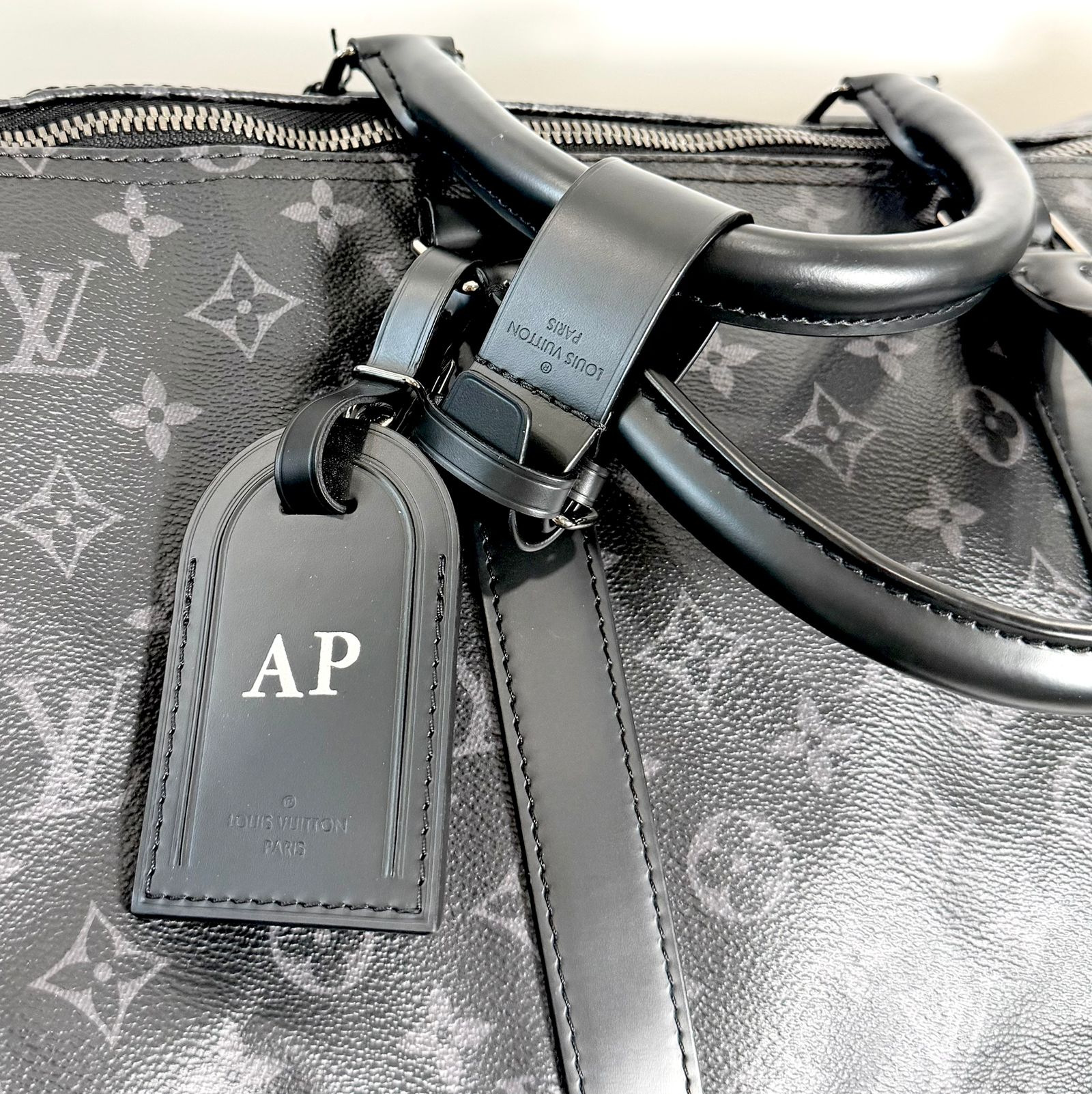 LOUIS VUITTON MONOGRAM ECLIPSE KEEPALL BANDOULIÈRE 55 DUFFLE BAG