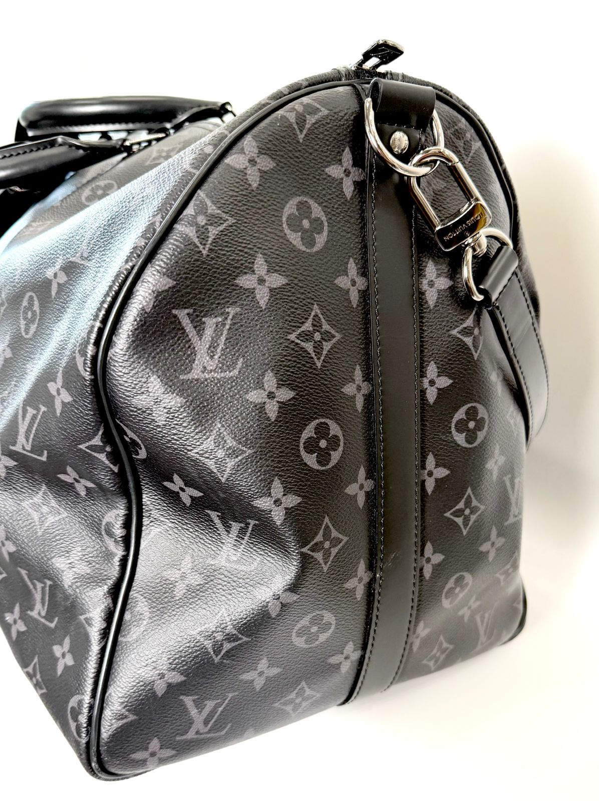 LOUIS VUITTON MONOGRAM ECLIPSE KEEPALL BANDOULIÈRE 55 DUFFLE BAG