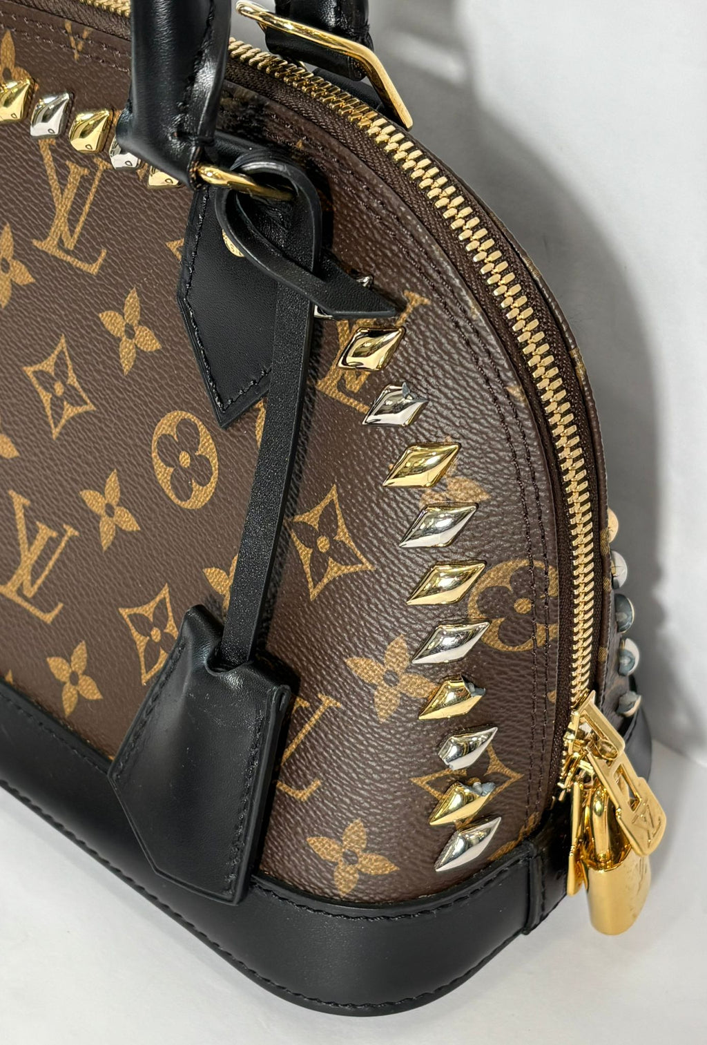 LOUIS VUITTON MONOGRAM MACASSAR STUDDED ALMA BB BAG
