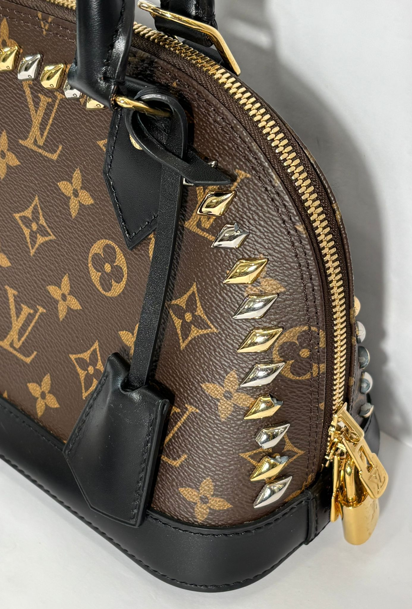 LOUIS VUITTON MONOGRAM MACASSAR STUDDED ALMA BB BAG