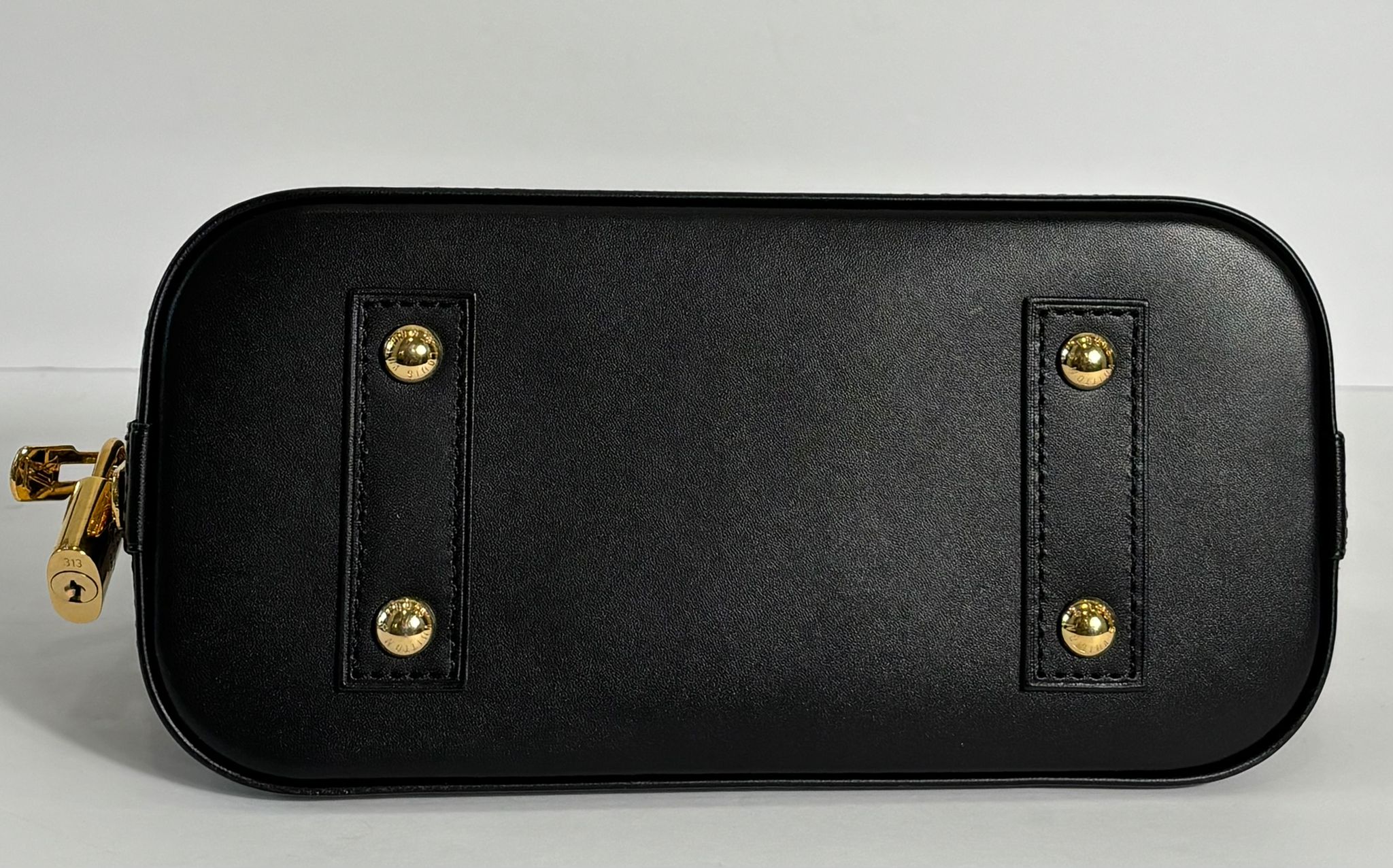 LOUIS VUITTON MONOGRAM MACASSAR STUDDED ALMA BB BAG