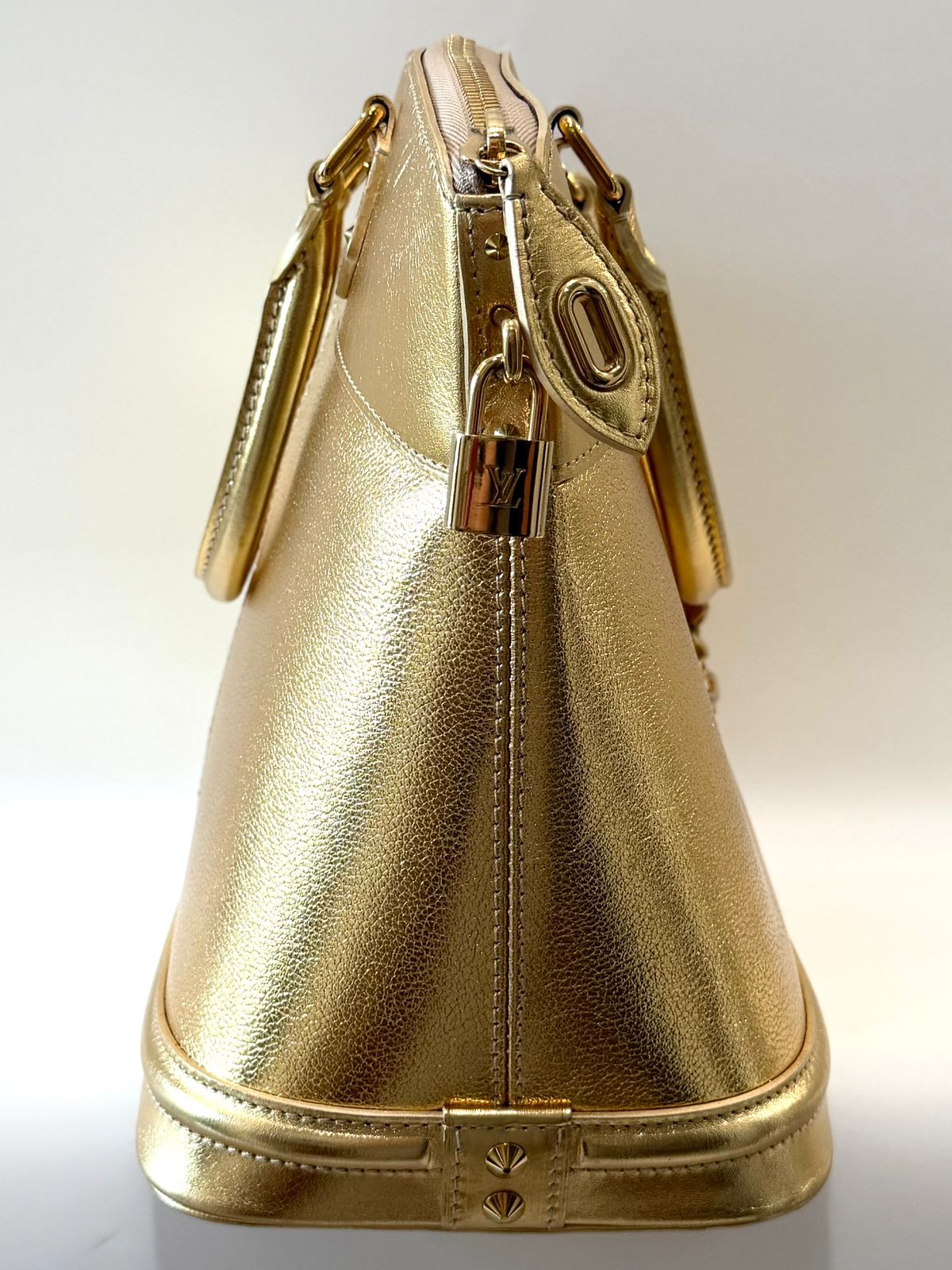 LOUIS VUITTON SUHALI METALLIC CALFSKIN LEATHER LOCKIT MM HANDBAG