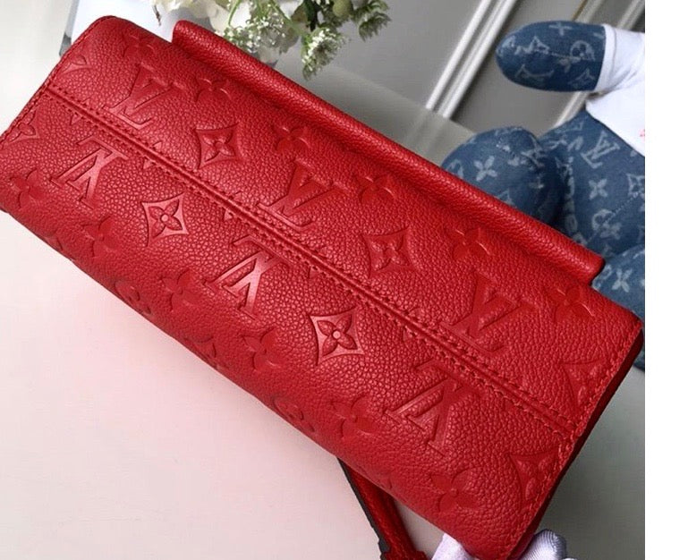LV MONOGRAM EMPREINTE LEATHER VAVIN PM CHAIN BAG