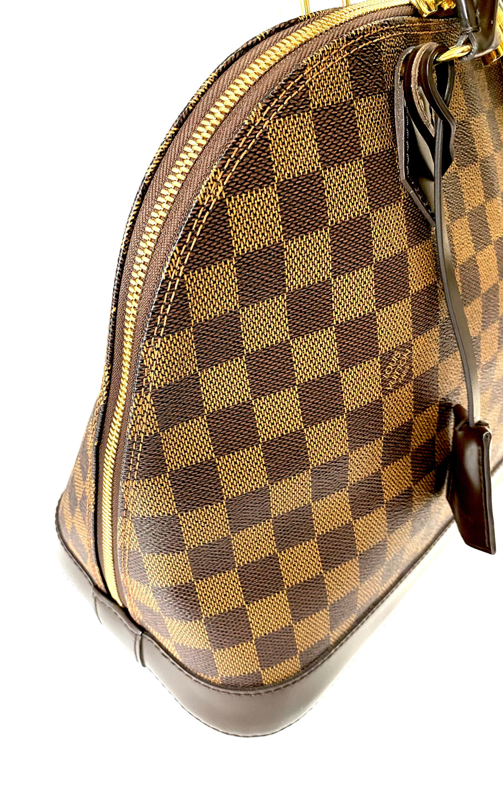 LOUIS VUITTON DAMIER EBENE ALMA MM HANDBAG