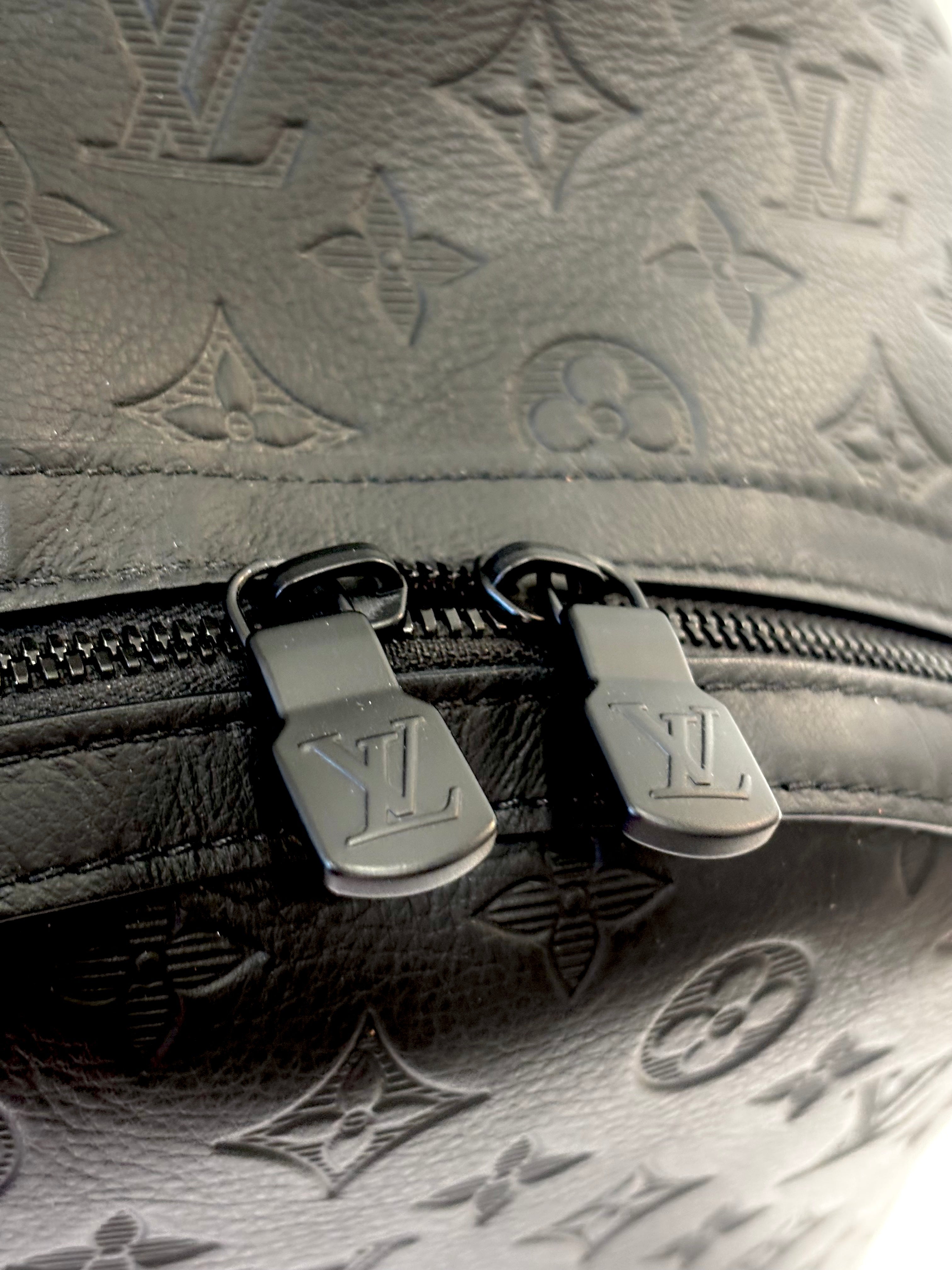 LOUIS VUITTON MONOGRAM EMBOSSED CALFSKIN DISCOVERY BACKPACK