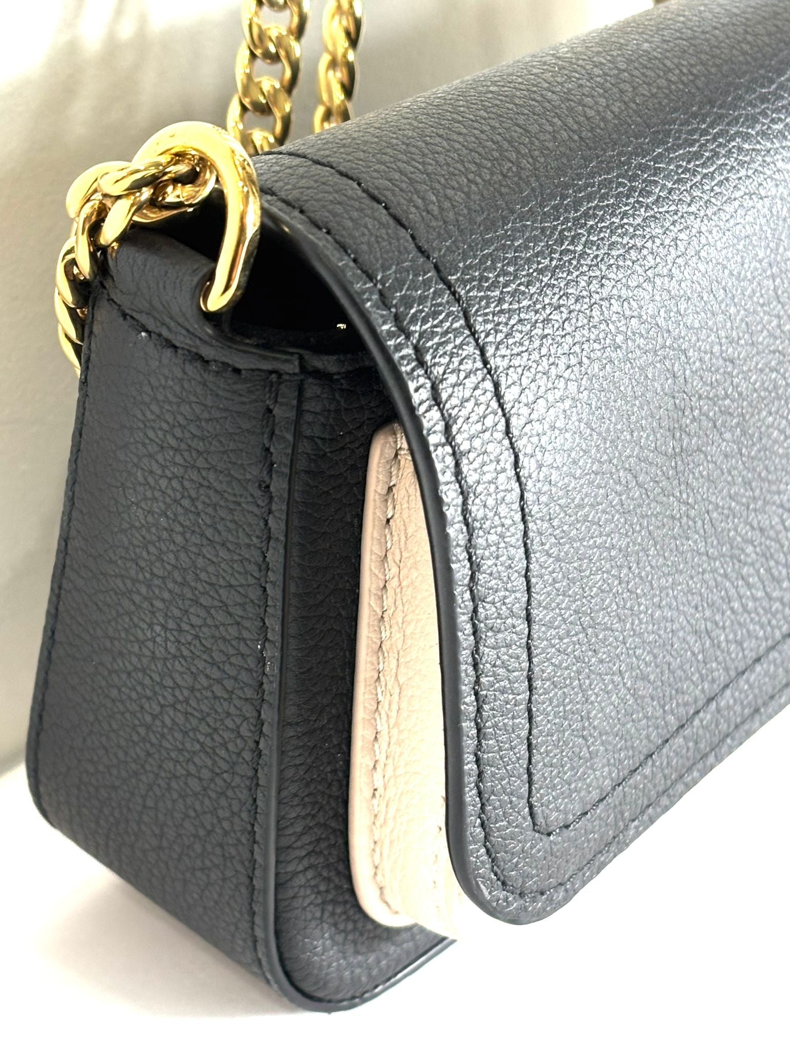 LOUIS VUITTON LOCK ME TAURILLON LEATHER TENDER CHAIN POCHETTE
