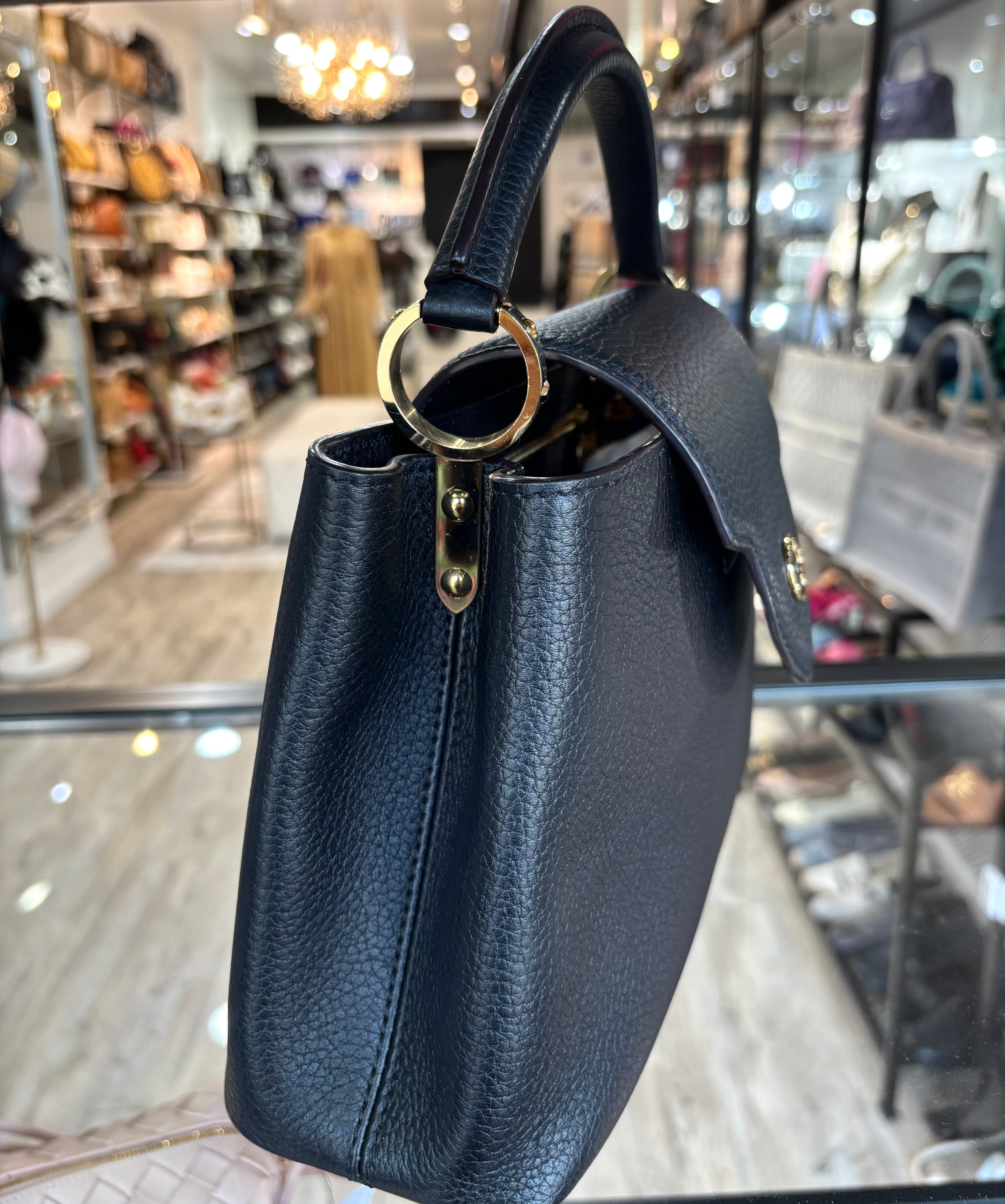 LOUIS VUITTON TAURILLON LEATHER SMALL CAPUCINES BAG