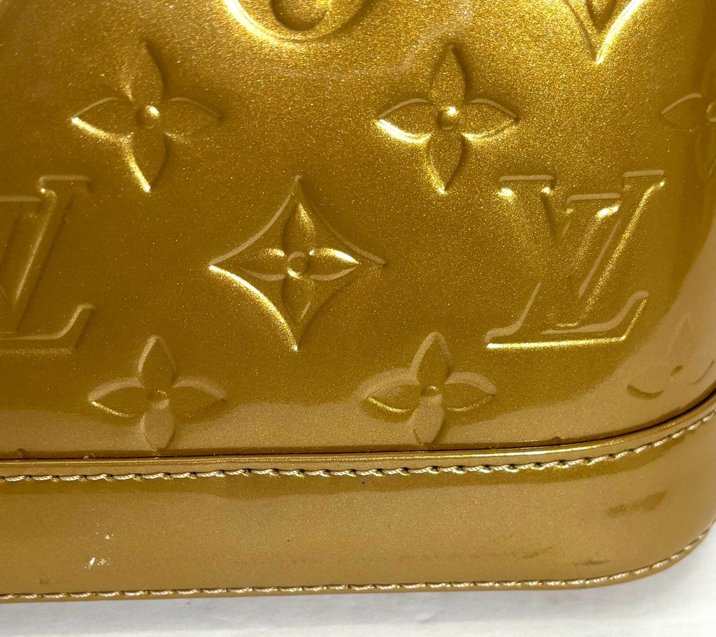 LOUIS VUITTON VERNIS ALMA BB HANDBAG GOLD