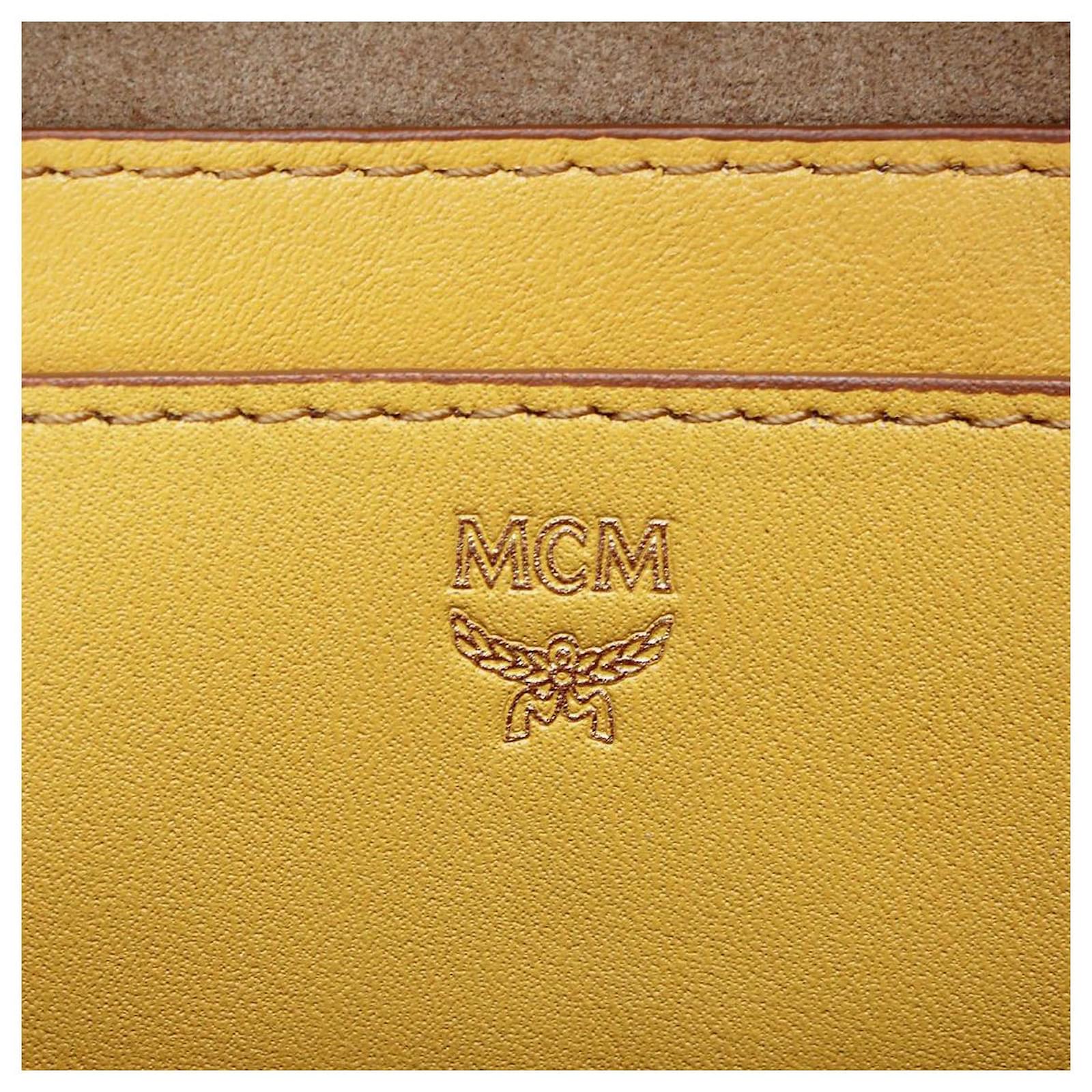 MCM STUDDED LEATHER MINI BACKPACK