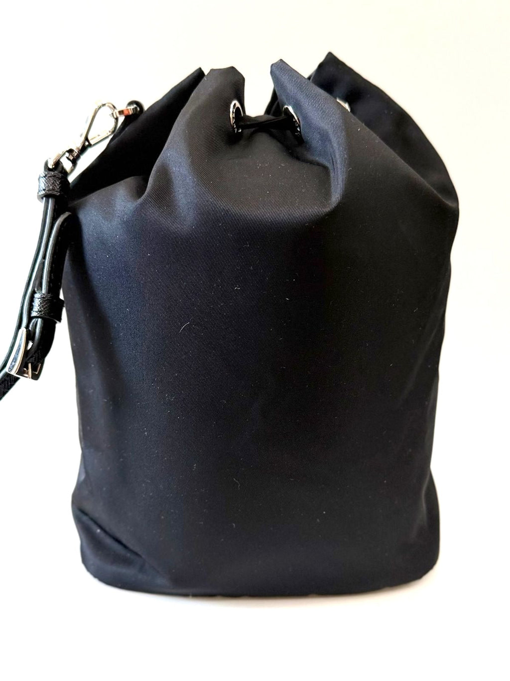 PRADA RE-NYLON TRIANGLE LOGO PLAQUE BUCKET POUCH WRISTLET