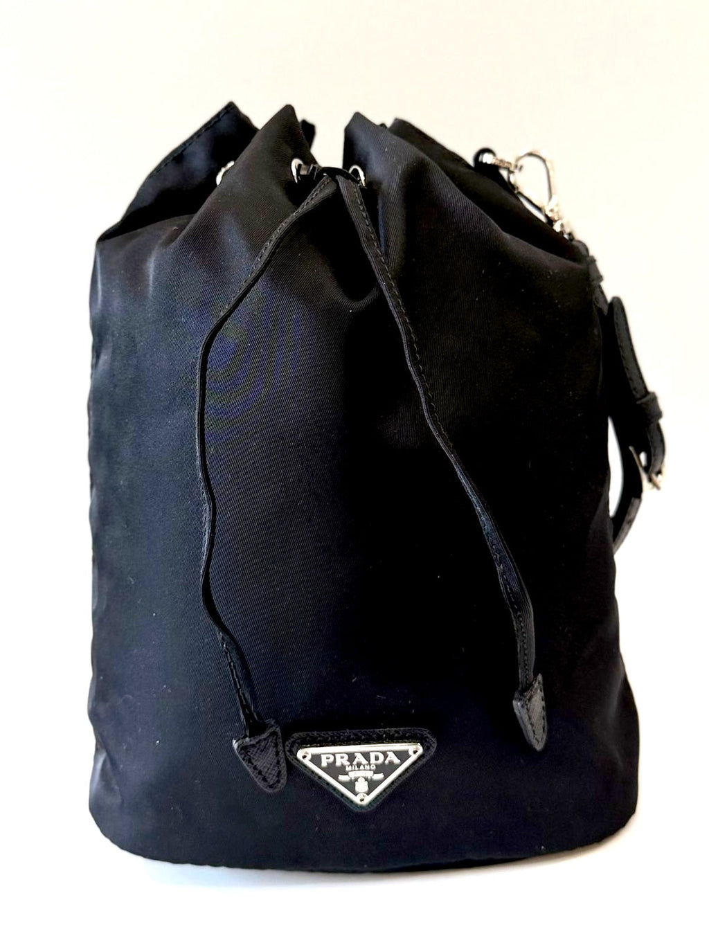 PRADA RE-NYLON TRIANGLE LOGO PLAQUE BUCKET POUCH WRISTLET