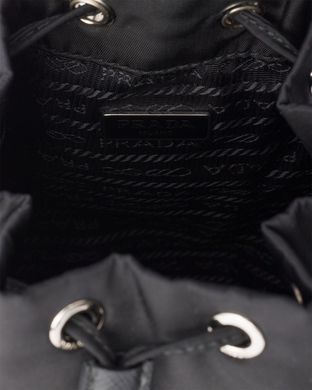 PRADA RE-NYLON TRIANGLE LOGO PLAQUE BUCKET POUCH WRISTLET