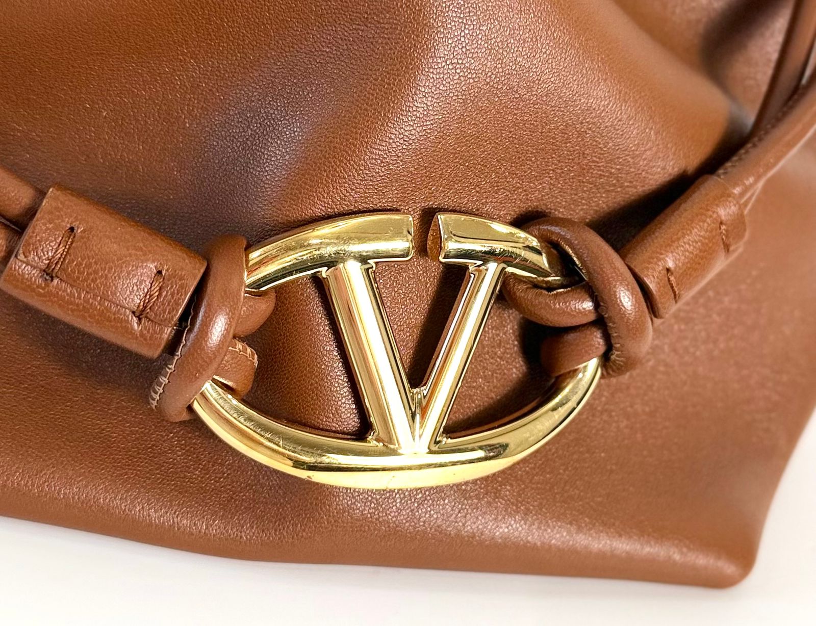 VALENTINO GARAVANI V LOGO CALFSKIN LEATHER DRAWSTRING BAG