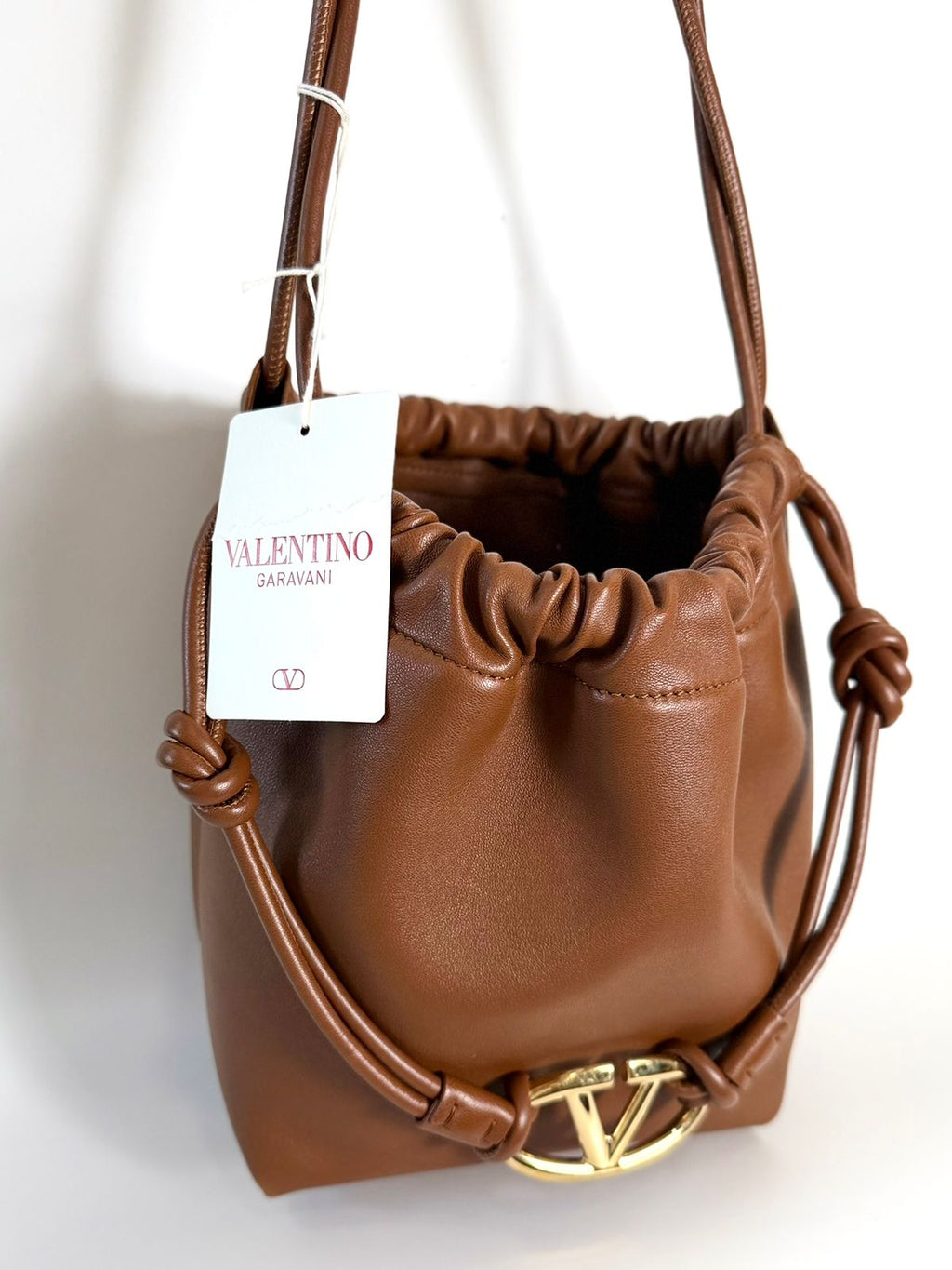 VALENTINO GARAVANI V LOGO CALFSKIN LEATHER DRAWSTRING BAG