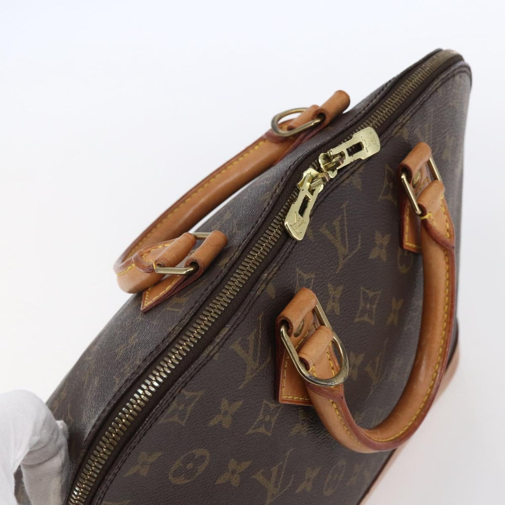 Louis Vuitton Alma Handbag Monogram Canvas Brown Canvas Handbag (Pre-Owned)