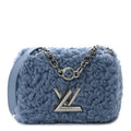 LOUIS VUITTON TWIST SHEARLING MM HANDBAG