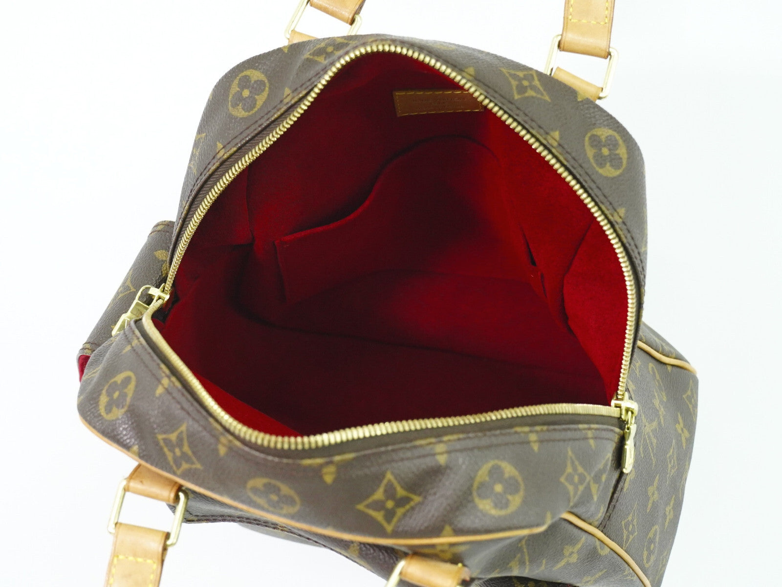 Louis Vuitton Excentri-Cite Handbag Monogram Canvas Brown Canvas Handbag (Pre-Owned)