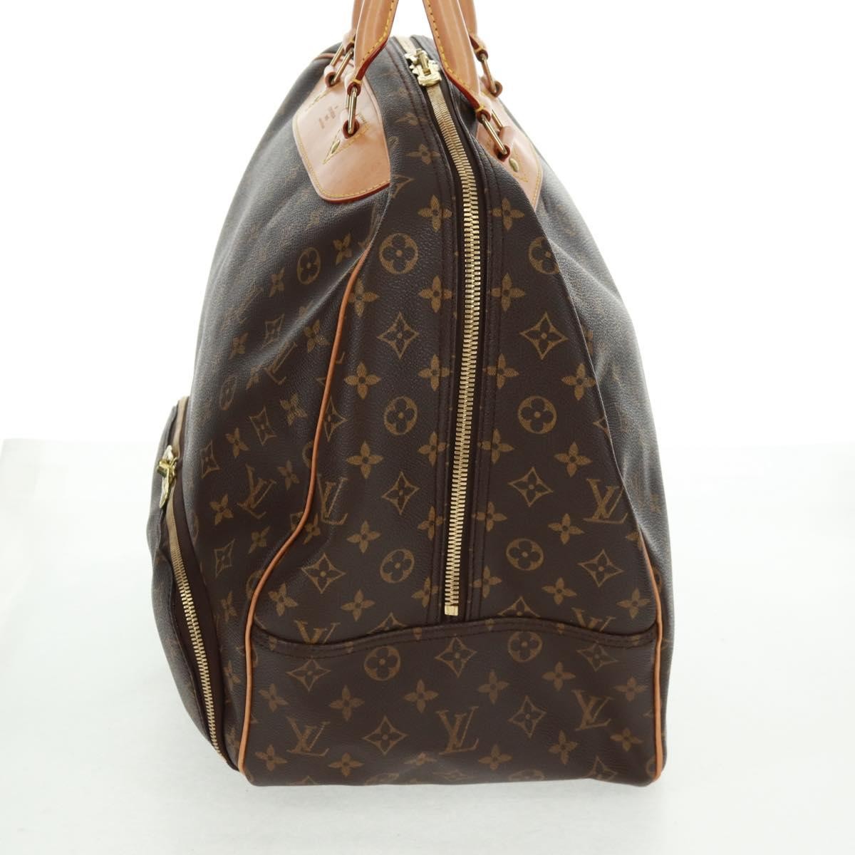 Louis Vuitton Evasion Travel Bag Monogram Canvas Brown Canvas Travel Bag Bag (Pre-Owned)