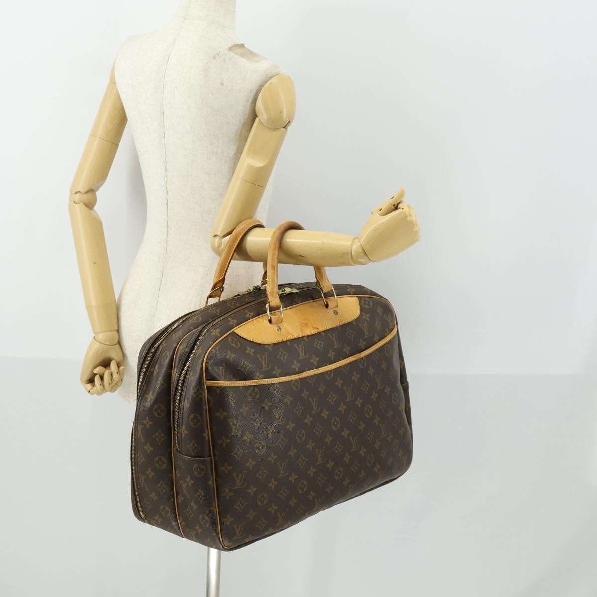 Louis Vuitton Alize Bag Monogram Canvas Brown Canvas Travel Bag Bag (Pre-Owned)