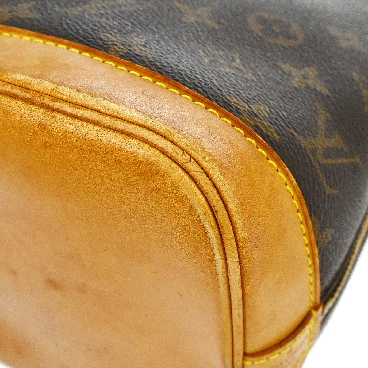 Louis Vuitton Alma Handbag Monogram Canvas Brown Canvas Handbag (Pre-Owned)