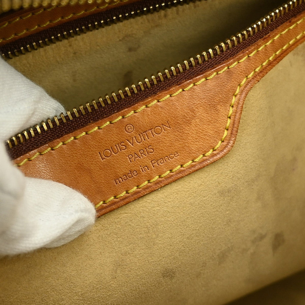 Louis Vuitton Cite Handbag Monogram Canvas Brown Canvas Clutche & Pouche Bag (Pre-Owned)