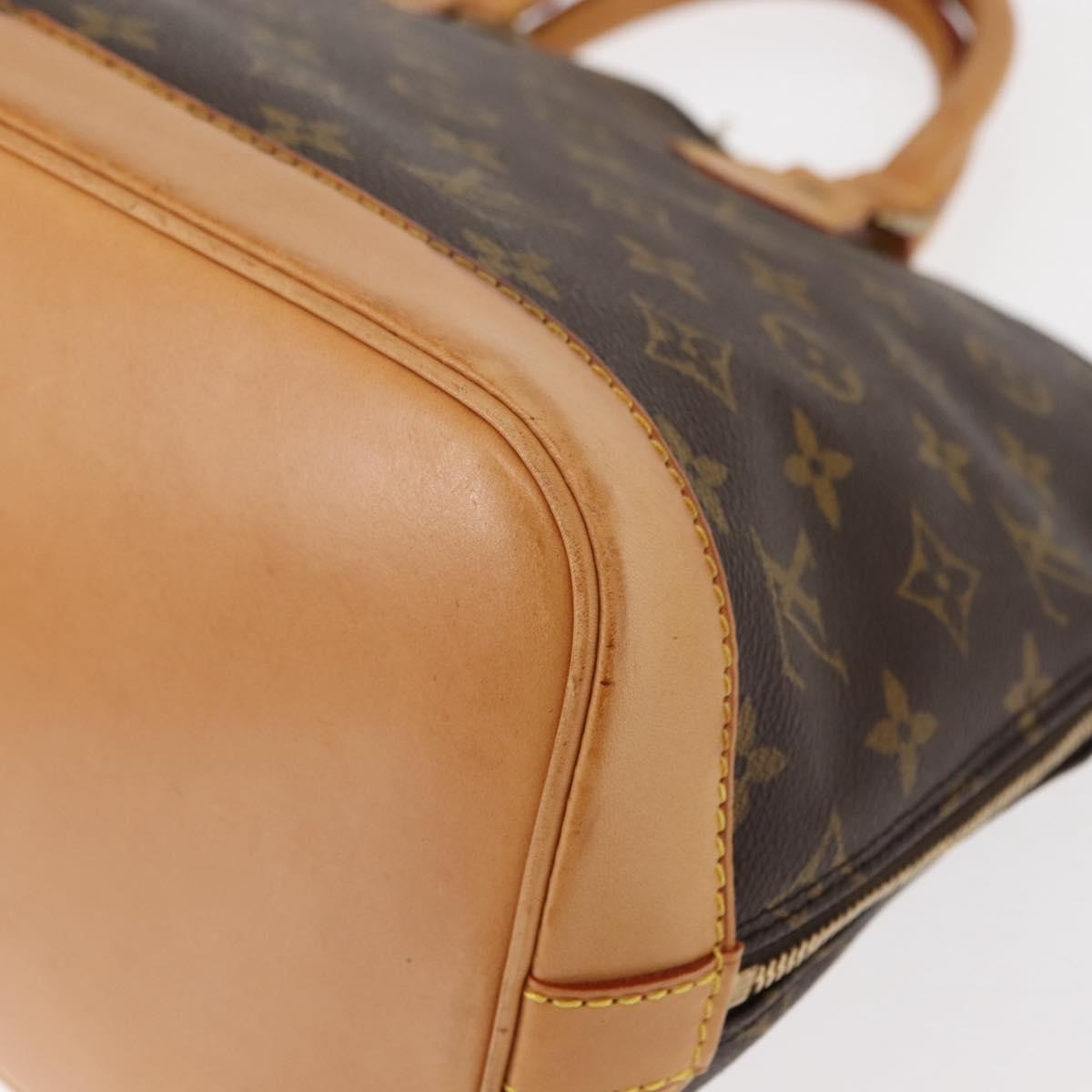 Louis Vuitton Alma Handbag Monogram Canvas Brown Canvas Handbag (Pre-Owned)