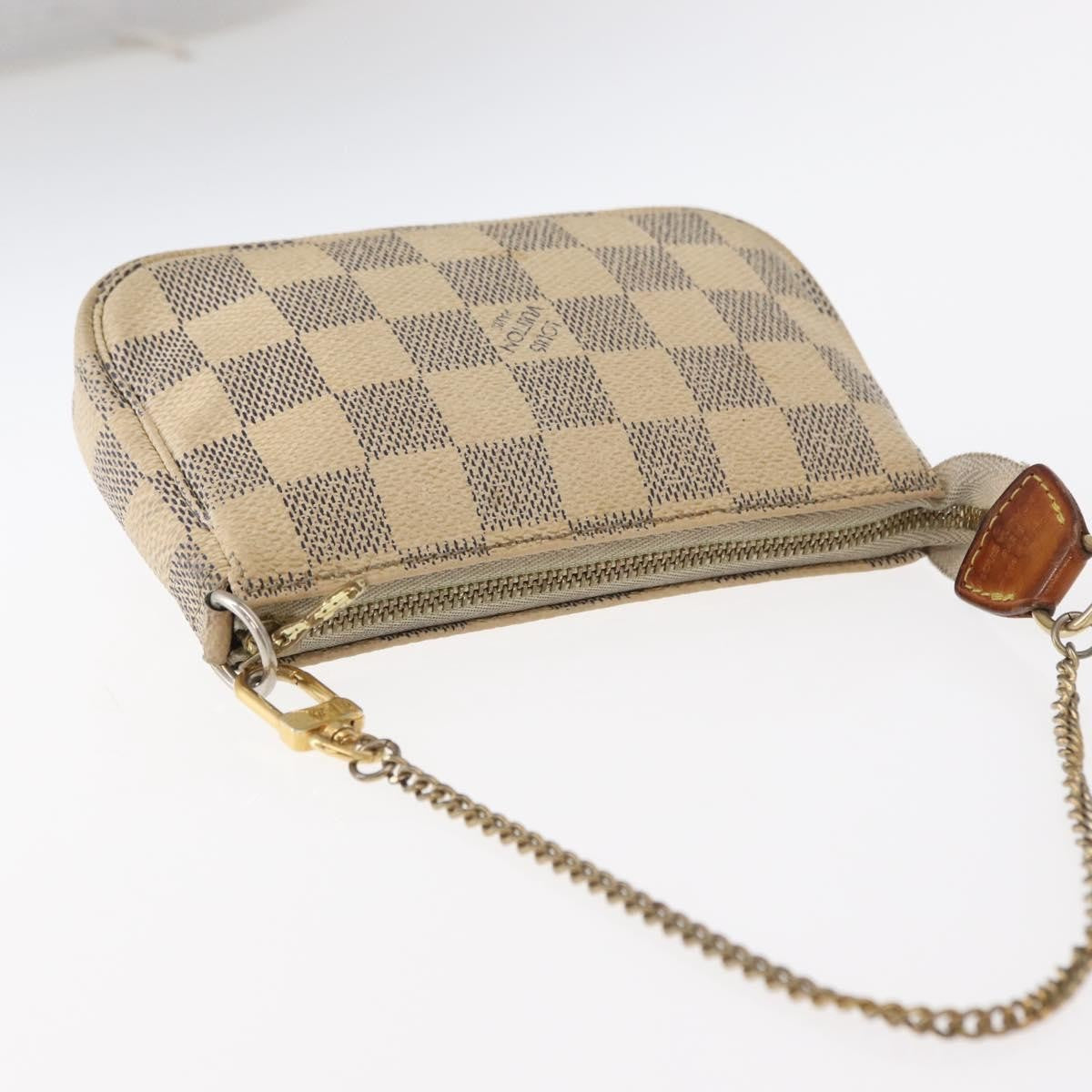 Louis Vuitton Mini Pochette Accessoires Damier Canvas White Canvas Clutche & Pouche Bag (Pre-Owned)