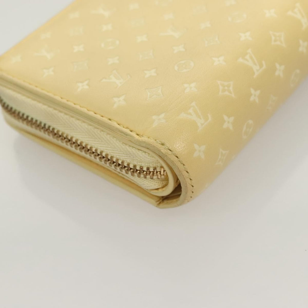 Louis Vuitton Lou Wallet Nanogram Leather Beige Leather Wallets Accessory (Pre-Owned)