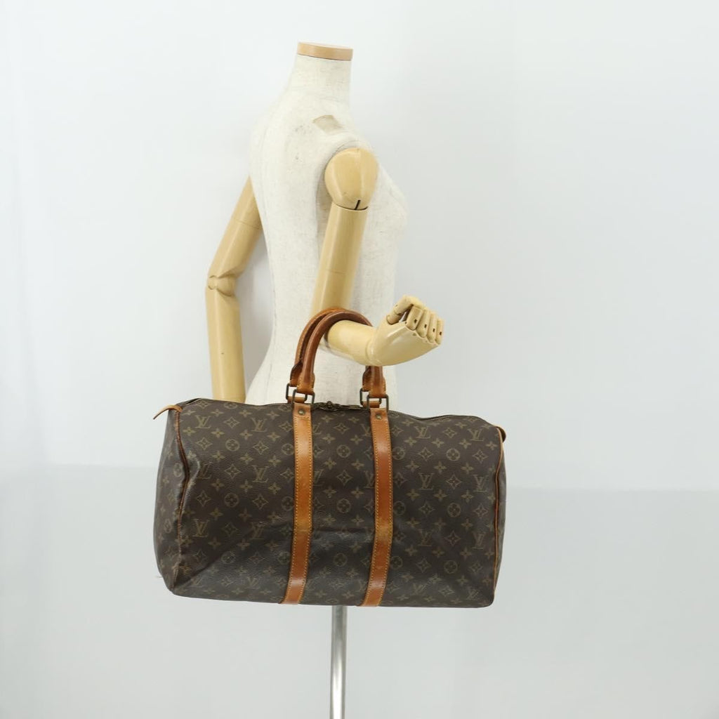 Louis Vuitton Keepall Bag Monogram Canvas Brown Canvas Travel Bag Bag (Pre-Owned)