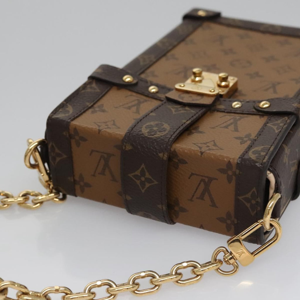 Louis Vuitton Vertical Trunk Pochette Reverse Monogram Canvas Brown Canvas Clutche & Pouche Bag (Pre-Owned)